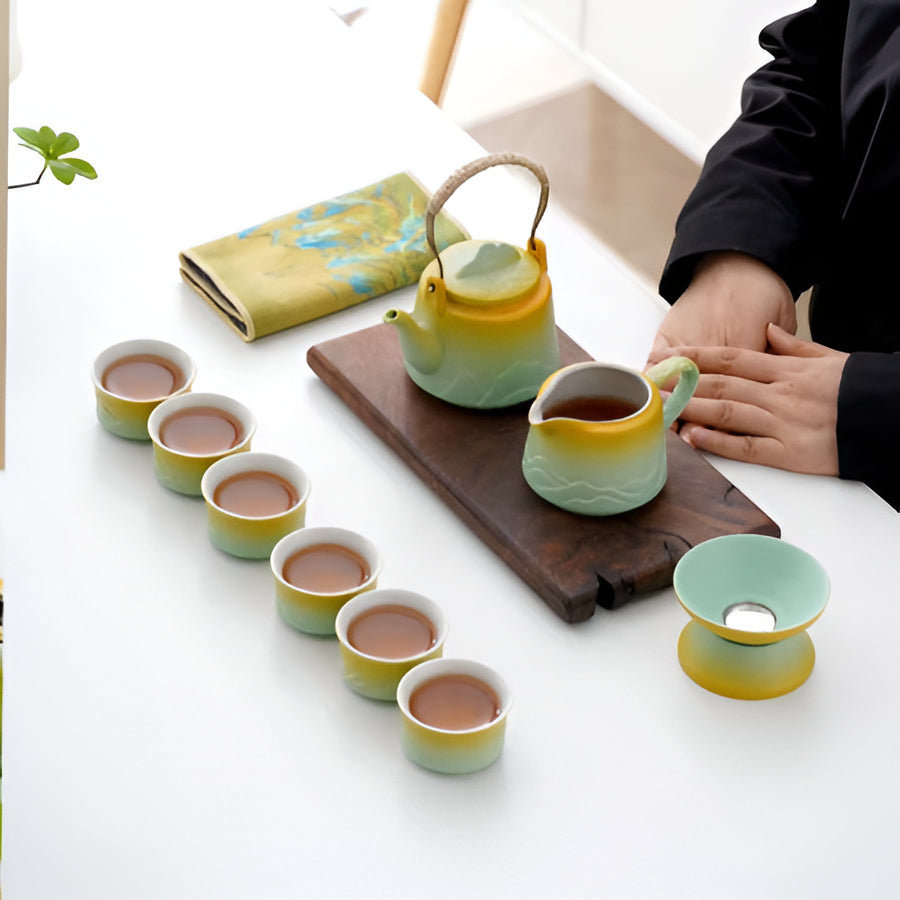 Traditional Asian Ceramic Tea Set with Teapot and Mugs