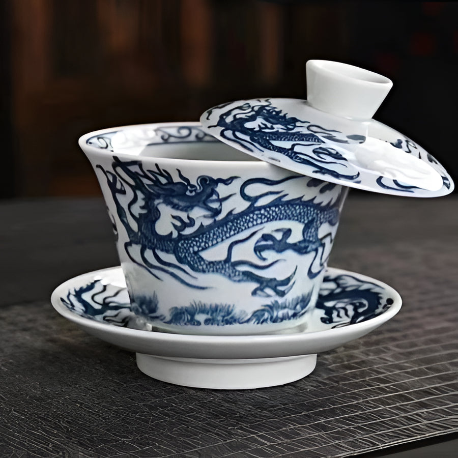 Delicate Blue Floral Porcelain Tea Cup Set with Gold Top