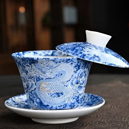 Delicate Blue Floral Porcelain Tea Cup Set with Gold Top