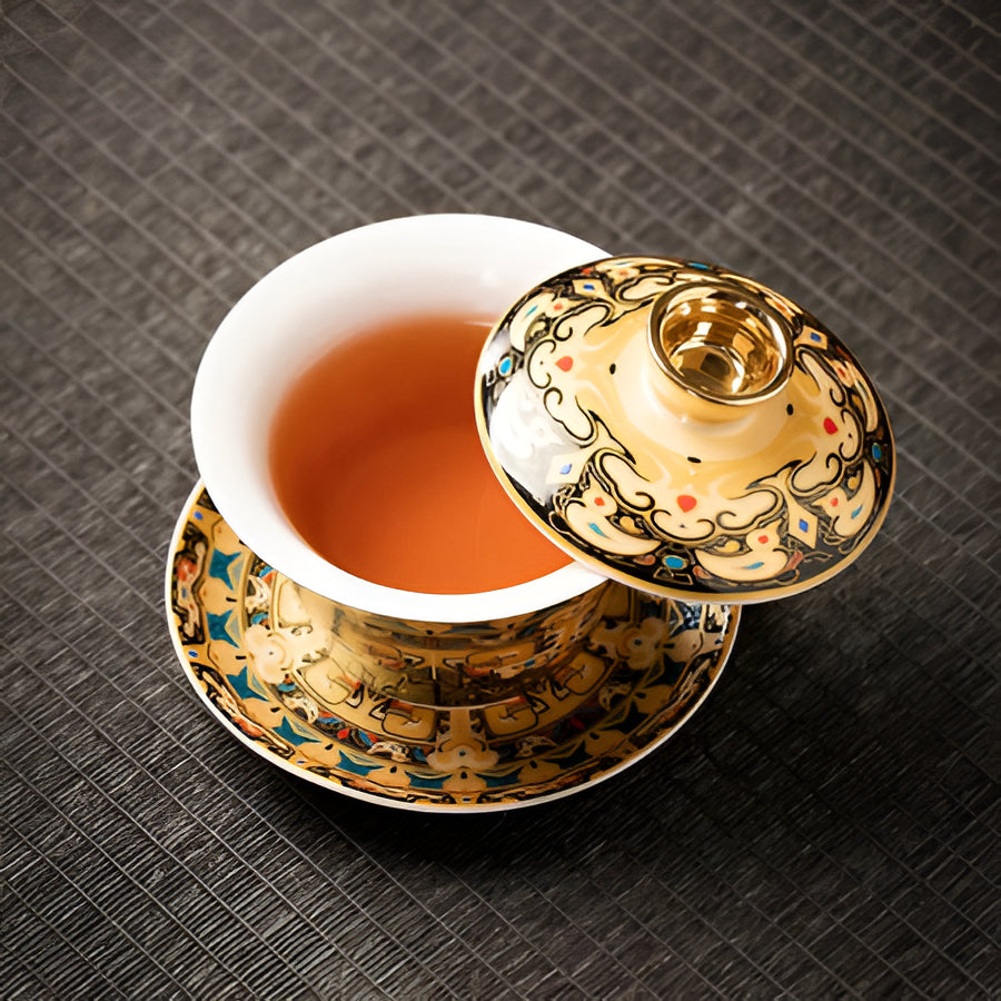 Delicate Blue Floral Porcelain Tea Cup Set with Gold Top