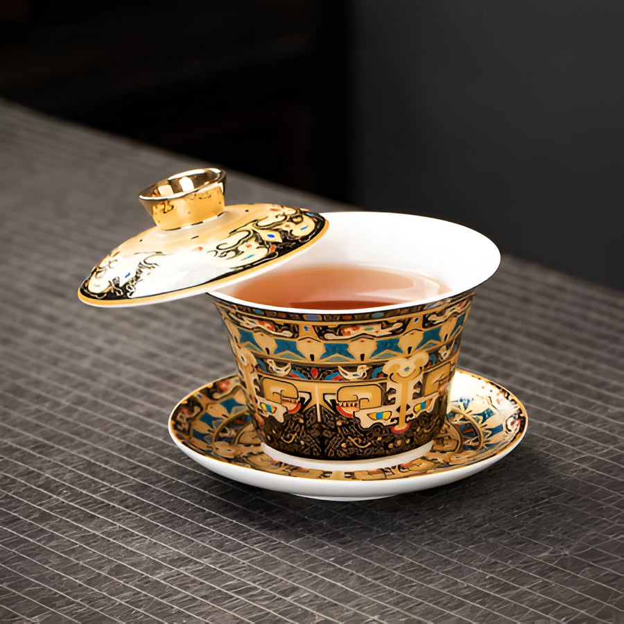 Delicate Blue Floral Porcelain Tea Cup Set with Gold Top