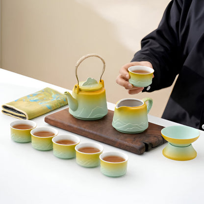 Traditional Asian Ceramic Tea Set with Teapot and Mugs