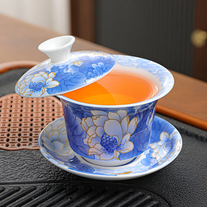 Delicate Blue Floral Porcelain Tea Cup Set with Gold Top