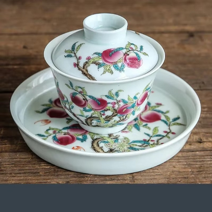 Traditional Asian Tea Set with Infuser and Decorative Cups