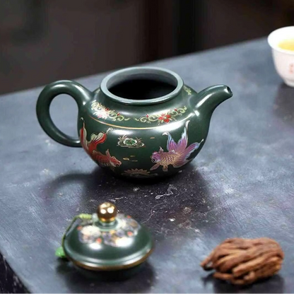 Traditional Chinese Purple Clay Teapot with Gold Fish Design