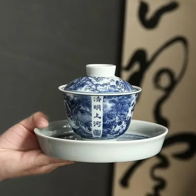 Traditional Asian Tea Set with Infuser and Decorative Cups