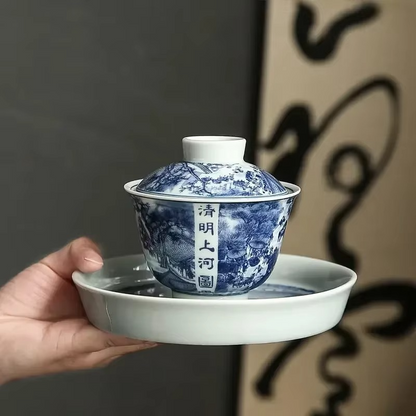 Traditional Asian Tea Set with Infuser and Decorative Cups