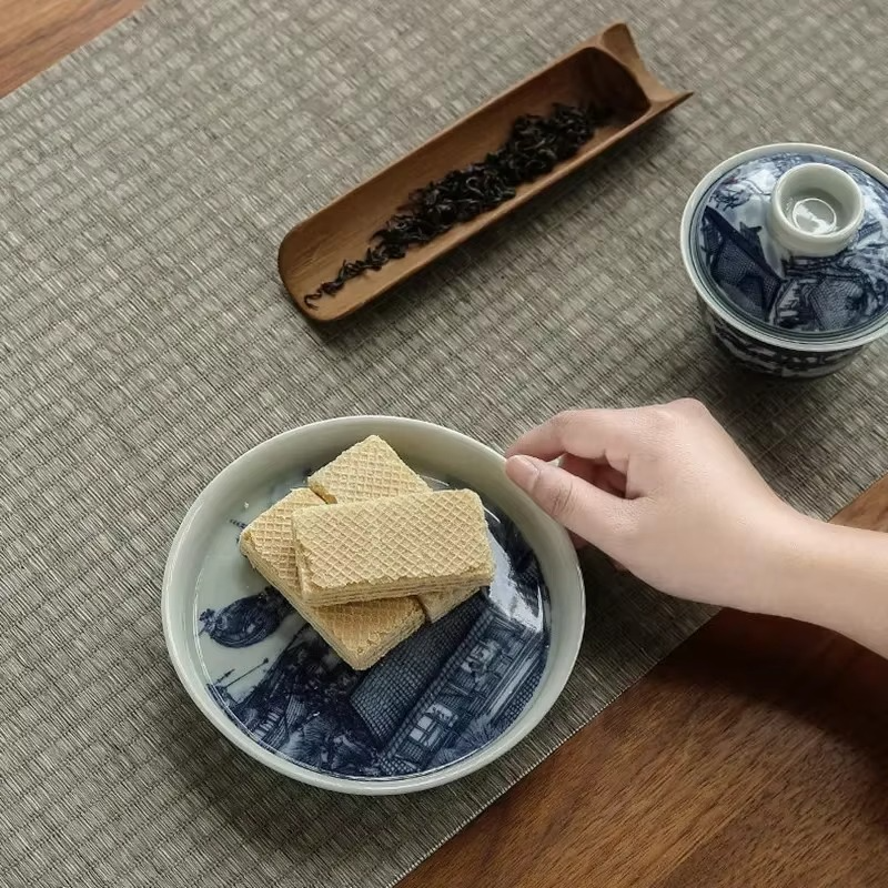 Traditional Asian Tea Set with Infuser and Decorative Cups